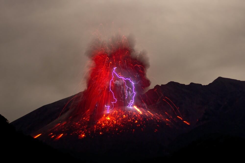smoke and lightning above a volcano in Japan